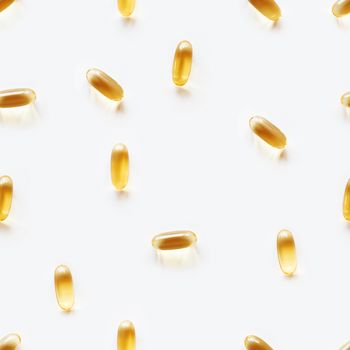 Seamless photo pattern with bright yellow capsules. White background with spilled yellow pills.