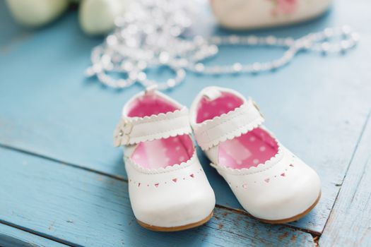 Cute leather booties for little girl. White accessory for girl o