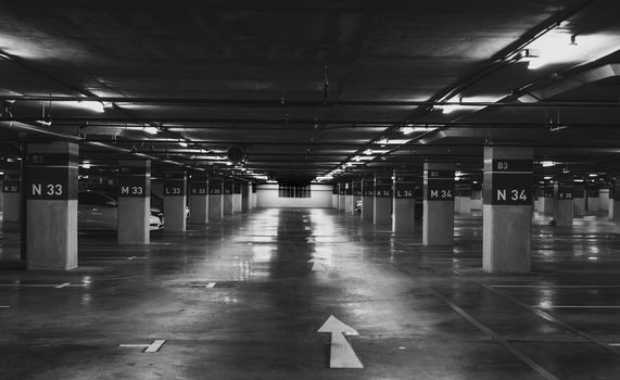 Underground car parking lot. Underground car parking garage at s