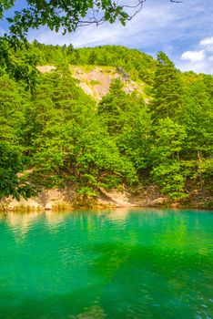 The Blue Lake from Romania change its color depending the light: from blue to emerald green. It resulted from the collapse of mine gallery in 1920.