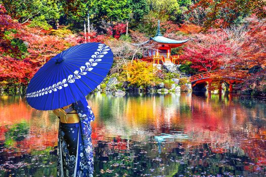 Asian woman wearing japanese traditional kimono in Daigoji temple, Kyoto. Japan autumn seasons.