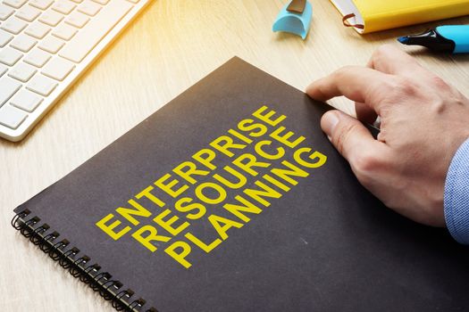 ERP Enterprise Resource Planning book on a table.
