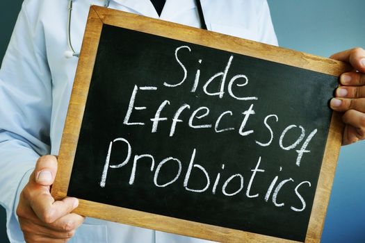 Side Effects of Probiotics written on a blackboard.