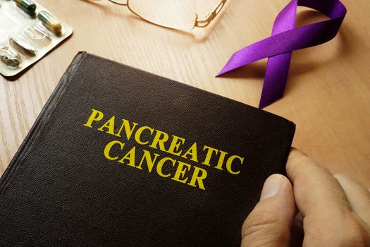 Symbol of pancreatic cancer. Purple awareness ribbon.