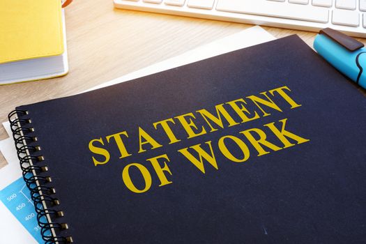 Statement of Work SOW on an office desk.