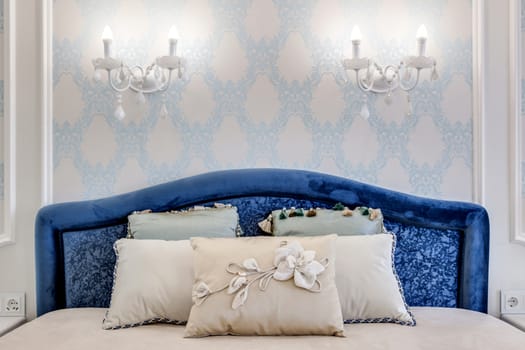 Luxurious headboard with decorative pillows