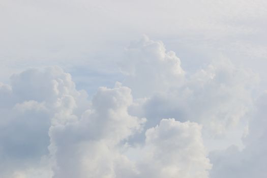 horizontal photo of white clouds and sky.