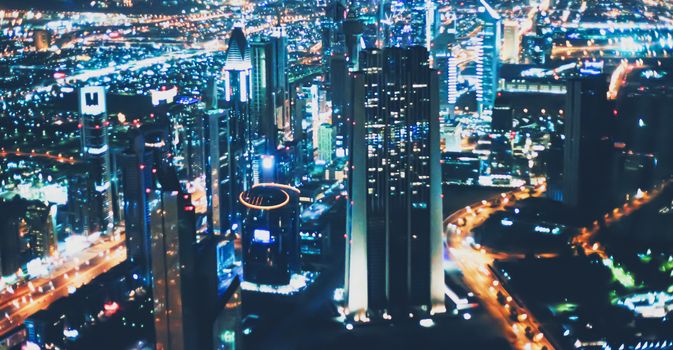 Aerial night view of Dubai in United Arab Emirates, metropolitan cityscape