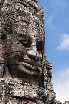 Towers with faces in Angkor Wat, temple complex in Cambodia and the largest religious monument in the world. UNESCO World Heritage Site.
