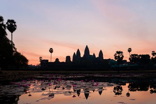 Sunrise in Angkor Wat, temple complex in Cambodia and the largest religious monument in the world. UNESCO World Heritage Site.