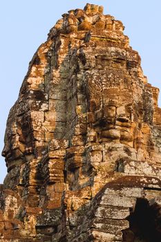 Towers with faces in Angkor Wat, a temple complex in Cambodia and the largest religious monument in the world. UNESCO World Heritage Site.