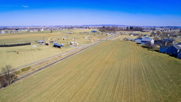 Amish farmlands by Rail Road Tracks