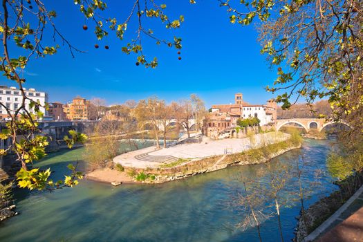 Rome. Tiber Island or Isola Tiberina on river in Rome view, The 