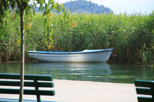 small fishing boat in lake