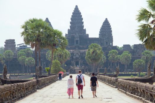 angkor wat entrance people walking to it in cambodia siem reap temples
