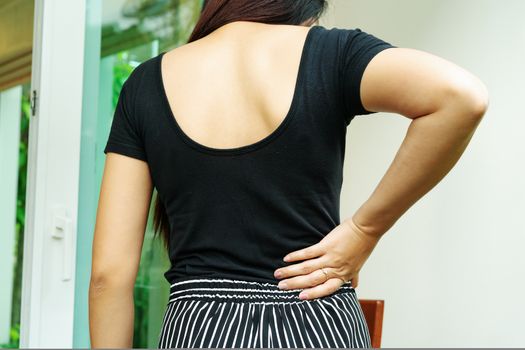 back pain at home. women suffer from backache. healthcare and me