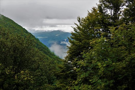 View over some hills of the Vosges on a cloudy and rainy day
