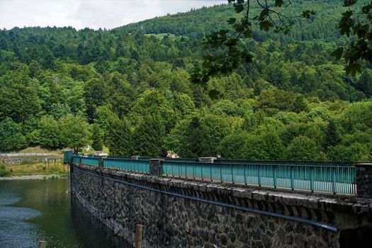 Bridge over the masonry dam at the Lac de la Lauch in the Vosges