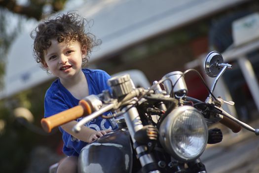 Baby on old motorbike 4