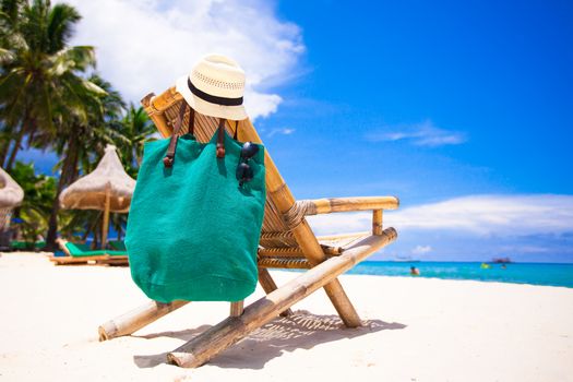 Beach wooden chair for vacations on tropical beach