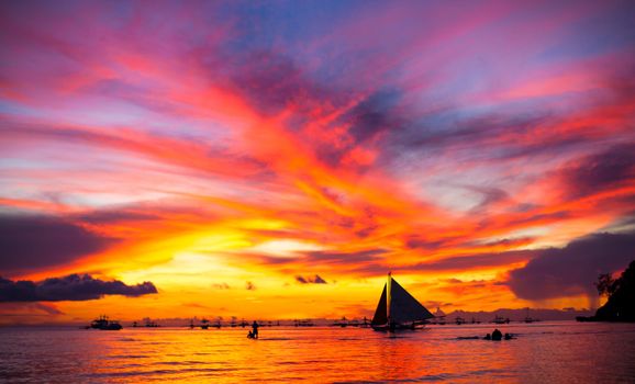 Sailing boat to the sunset