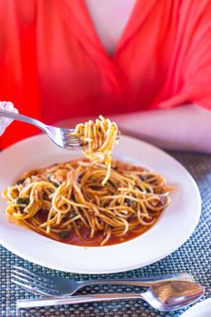 Spaghetti a la Bolognese in the white plate