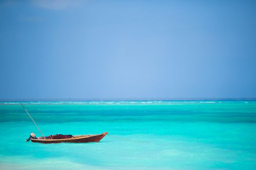 Wooden fishing boat on sea of Zanzibar Island