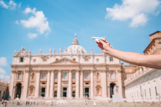 Close up model plane in Vatican city and St. Peter's Basilica church, Rome, Italy.
