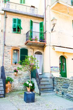 Old beautiful empty narrow streets with old house and stairs in coastal village Monterosso in Cinque Terre, Italy