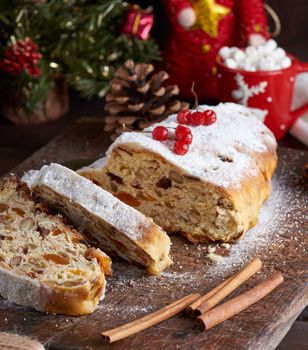 traditional European Stollen cake with nuts and candied fruit 