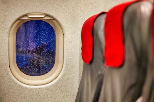Photo of window seat in airplane