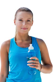 Cutout of active woman wearing sports wear while drinking energy drink