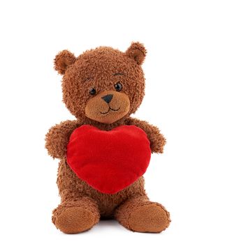 cute brown teddy bear holding a big red heart 
