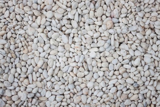 White pebbles textured abstract background
