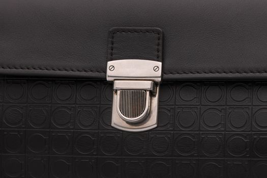 the clasp on the black bag