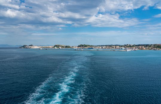 Wake behind departing cruise ship from Kerkyra on island of Corfu
