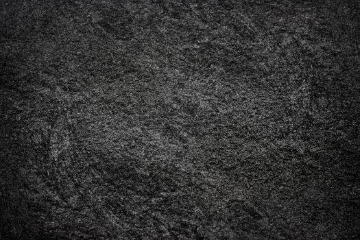 Texture of the Black Stone. Natural Dark Rock Background. Wall a