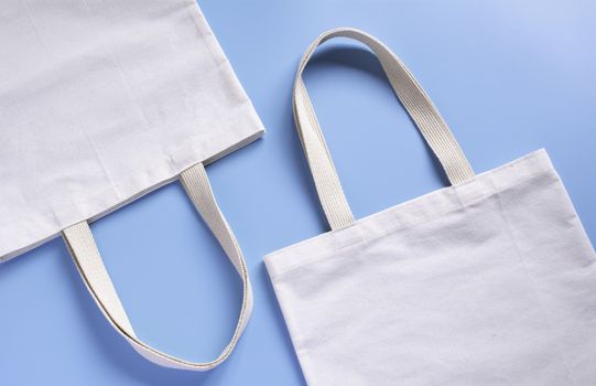 White tote bag canvas fabric. Cloth shopping sack mockup with co
