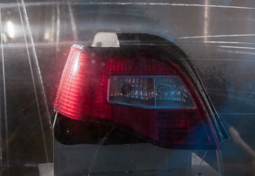 a car headlight on a black background