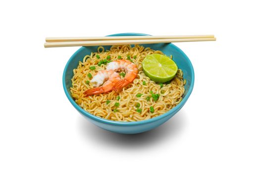 Bowl of instant noodles and shrimps with chopsticks isolated on 
