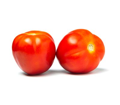 Fresh tomatoes isolated on white background. Close up of tomatoe