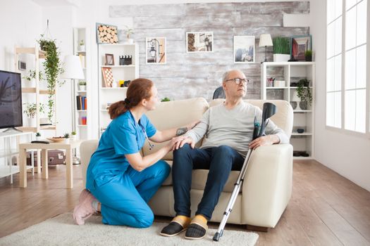 Pretty nurse trying to get old man attention