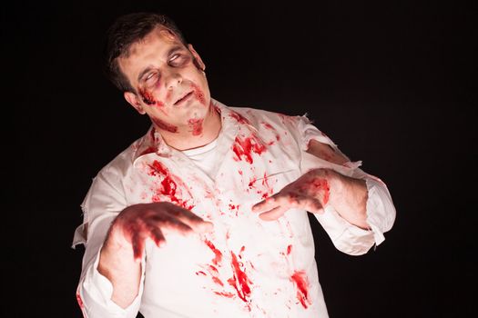 Haunted zombie with blood all on his face