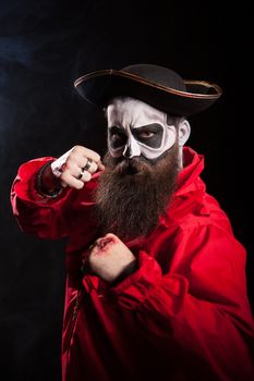 Medieval mariner with beard and hat isolated over black background