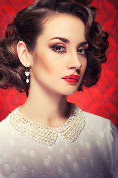 Beautiful woman toned image on vintage red background