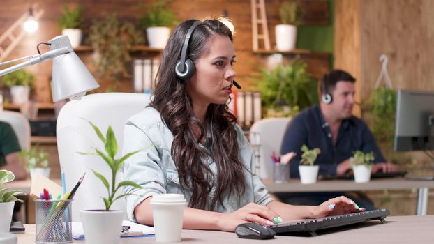 Customer support operators are working in cozy office