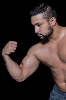 Bodybuilder man flexing his muscles