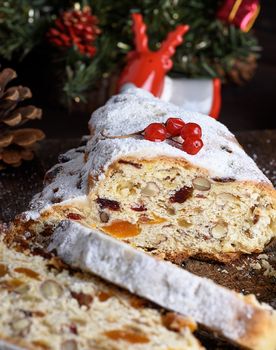 Stollen baked a traditional European cake with nuts and candied 