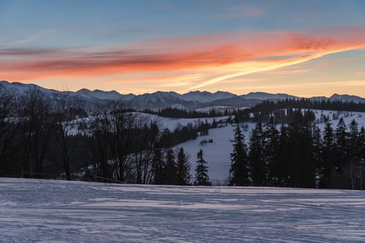 Winter landscape of High Tatra Mountains at dusk