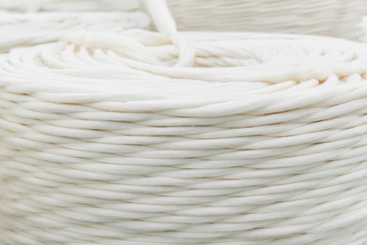coils of textile yarns